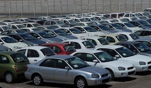 Dueños de dealers han advertido de que el cobro anticipado de un impuesto de 17% por la primera placa los haría desaparecer del mercado.